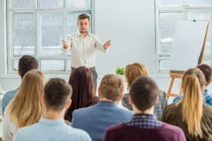Speaker at Business Meeting in the conference hall.